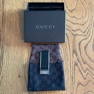 Gucci Alligator money clip never used with original box and storage bag.